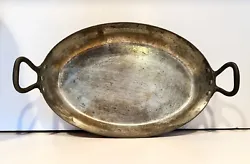 Here is a stamped Villedieu France Copper Oval Au Gratin Pan with brass handles10.5