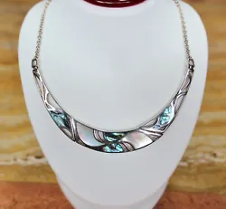 Genuine abalone and mother of pearl. Sterling silver necklace. Lobster Clasp Closure.