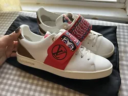 Louis vuitton authentic sneakers. put it on several times. Shoes are in good condition. Marked size 38.5. I think its...