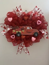This is a pretty deco mesh valentines wreath. I did this on a wire heart frame. I used a heart shaped wire frame and...