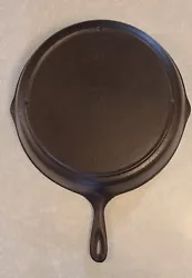Beautifully restored 3 notch Lodge Skillet. Pan is in like new condition. No chips, cracks or repairs.  It does have a...