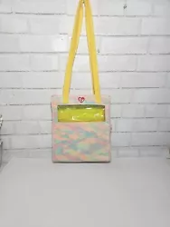 Tie die plush TY carrier. Has 6 clear pockets for Ty beanies. Good condition - has spot of red tint on one clear...