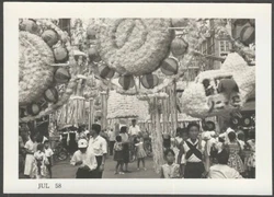 Lots of wonderful decorations here, but the one that caught my eye is the helicopter hovering halfway up the right side.