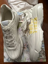 Brand new Gucci Rhyton sneakers tiger. Bought straight from Gucci. Comes With receipt. Receipt is blacked out because...