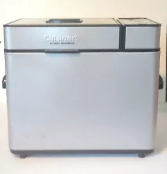 Used Cuisinart Automatic Breadmaker in working condition. It has a few marks and one small dent on the back as...