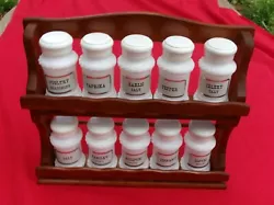 from the 1960s. 11 inches wide and 10 inches high. 2 inches deep. Jars are in perfect condition.  Labels are in good...