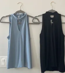 Two Banana Republic shirtsBoth are the same style halter tops, they tie around the neck. One black and one blue. Blue...