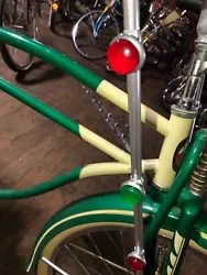 Adjustable to fit most bicycles. You can choose from RED, GREEN, OR BLUE for the jewels. NICE SHINY PARADE CRASH BARS...