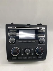 10-13 Nissan Altima Coupe AM FM Radio Bose Display Climate AC Heater Bezel OEM. USED OEM product but in good...
