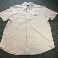 Button down buttons on neck collar show wear from dry cleaning (pictured), small hole near bottom of shirt placket on...