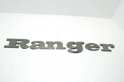 Here is a FACTORY Ranger BASS Boat Raised Decal Emblem 7604313 BLACK CHROME FACTORY USED. FACTORY USED EMBLEM. There...
