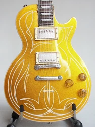 Qualité USA : irréprochable, véritable réplique miniature de la guitare mythique Les Paul Goldtop 