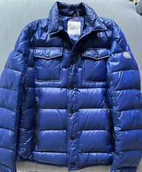 Moncler quilted Down shirt jacket Size 4 (USA - XL). Point collar; snap front closure. Fill: Down/feather. Snap cuffs....