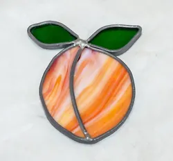 This is a Stained Glass Suncatcher PEACH.