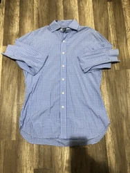 This Polo Ralph Lauren button-up shirt is a must-have for any fashionable mans wardrobe. With its stylish blue color...