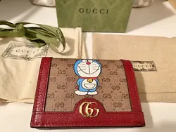 SOLD OUT - Authentic NWT Gucci x Doraemon GG Supreme Monogram Card Case Wallet - red/beige. Don’t miss your chance to...
