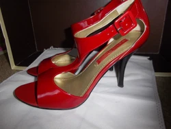 Features: T-strap, Buckle, open toe. Gently worn, clean and in good pre-owned condition. Heel Height: 3.5