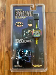 This vintage 1989 Batman Video Game Watch by Tiger is a must-have for any collector or fan of the Caped Crusader. With...