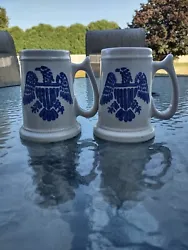 2 Pfaltzgraff eagle stein Tankard stoneware Yorktowne. If you can tell from the pictures, the one on the right has a...