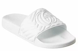 Quilted design with GG motif at strap. Rubber upper, lining and sole.