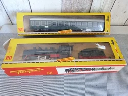Locomotive et wagons ho boite abîmée.