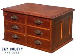 The cabinet has 6 large drawers with a molded base & molded top edge. The cabinet has double panel sides and a double...