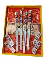 Yunhong Chopsticks 4 Pair Display Case.Condition is excellent.These appear to be unused as they are still intact in...