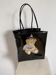 Soooooo cute!Retro collectible!This Bloomingdales Little tote is a must-have for any fan of the 2000 Party Bear theme....