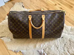 Beautiful 100% authentic Louis Vuitton Keepall 55 duffle luggage bag. A few stray threads. Great piece with a ton of...