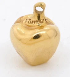 This exquisite charm pendant by Tiffany & Co. and Peretti is made from solid 18k yellow gold. This wonderful charm is...