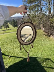 Add some vintage charm to your home with this beautiful oval mirror. The mirror features a semi-gloss wooden frame in a...