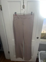 Elevate your wardrobe with these sleek and stylish Express Columnist pants. Featuring a flattering high-rise fit and...