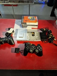 Playstation 2 Slim Grise Avec 5 Jeux En bon état Deuxième manette à vérifier.