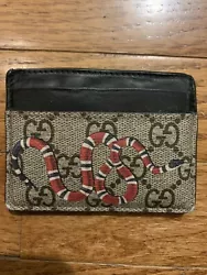 Kingsnake print GG Supreme card case 100% Authentic. Please note that there is a tear in the inside seam of one of the...