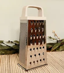 Vintage Retro Stainless Steel Cheese Grater - White Handle. Excellent Pre-owned condition. Handle is a plastic...