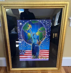 Signed by the artist Peter Max. Entitled: PEACE ON EARTH. Peace on Earth.