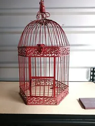 Add a vintage touch to your home decor with this stunning bronze birdcage from The Interior Gallery. This medium-sized...