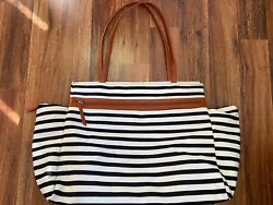 DSW Exclusive-Striped Overnighter Large Tote Bag Black White Canvas brown faux leather Strap.  Very nice roomy bag,...
