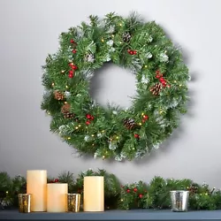 MIXED NEEDLES: From its glitter frosted needles to its bright red berries and snow powdered pine cones, our wreath...