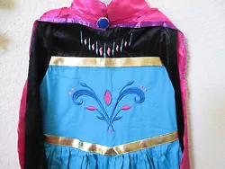 Frozen Queen Elsa Inspired Coronation dress with pink cape and back hidden zipper. Two pieces. Sleeves and top black...