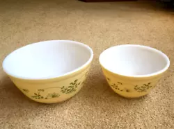 Set of 2 Pyrex mixing / serving bowls. Shenandoah pattern is yellow with green floral pattern. Sizes #401 & #402. These...