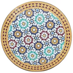 Au Table bistrot Ankabut Jaune les joints entre les différentes pièces de la mosaïque sont clairement visibles. Cest...