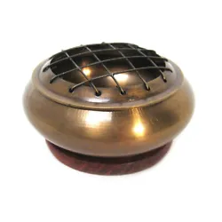 This antiqued brass incense burner offers a convenient way to burn your resin, powder, and cone incenses, while...