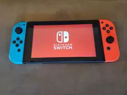 Nintendo Switch 32GB handheld console. Includes neon red & neon blue Joy-Cons + all original accessories.