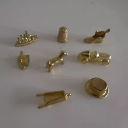 8 miniatures métal dorure art-déco collection design XXe France. Lot de collection à saisir en état. Collection lot...
