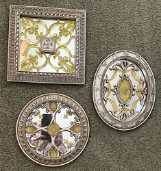 The mirrors have a greenish gold accent in the middle.