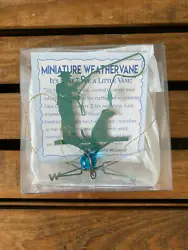 NWOT Kate McConnell fishing man with dog miniature weathervane turquoise charm ornament with information card and box.
