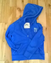 Blue color, full zip with hood. Cute little graphic in the back. Worn once and in excellent condition. No defects or...