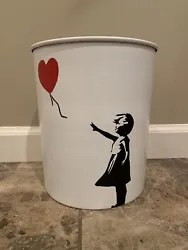 For the art enthusiast, this Banksy-inspired waste bin is sure to add style to any room! Condition is 
