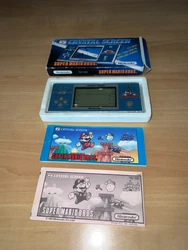 NINTENDO GAME & WATCH CRYSTAL SCREEN« Super Mario Bros » (YM-801), USA/ Import FR (1986) Notice rose Fr, complet.Bel...
